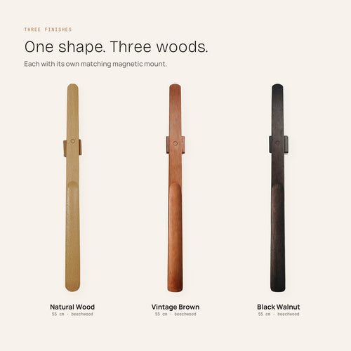 All three finishes — Natural Wood, Vintage Brown and Black Walnut — each with its magnetic wall mount